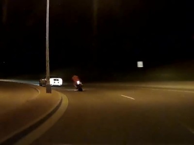 Mustang knocks dude off motorcycle
